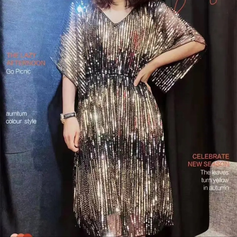 Gold and black sequin party dress